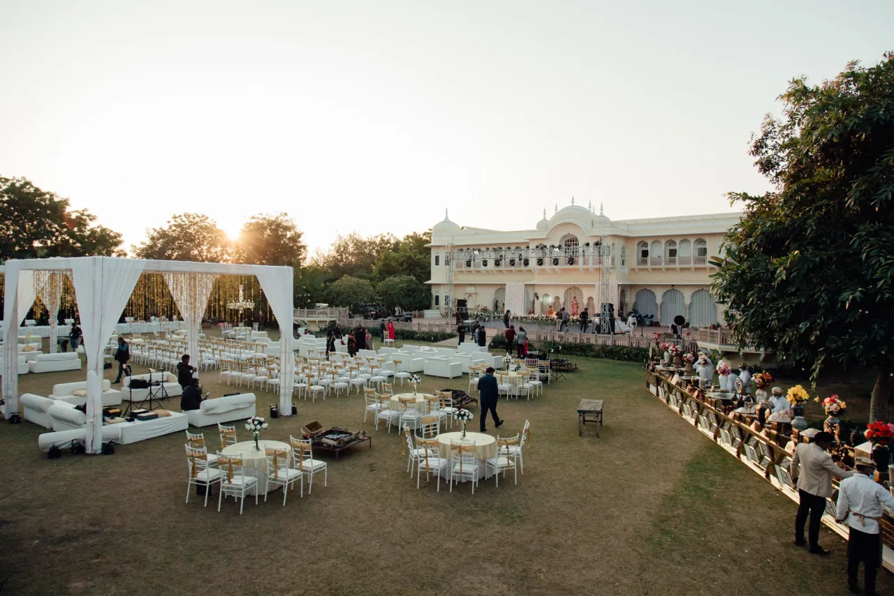 Elegant outdoor celebration venue arranged at sunset